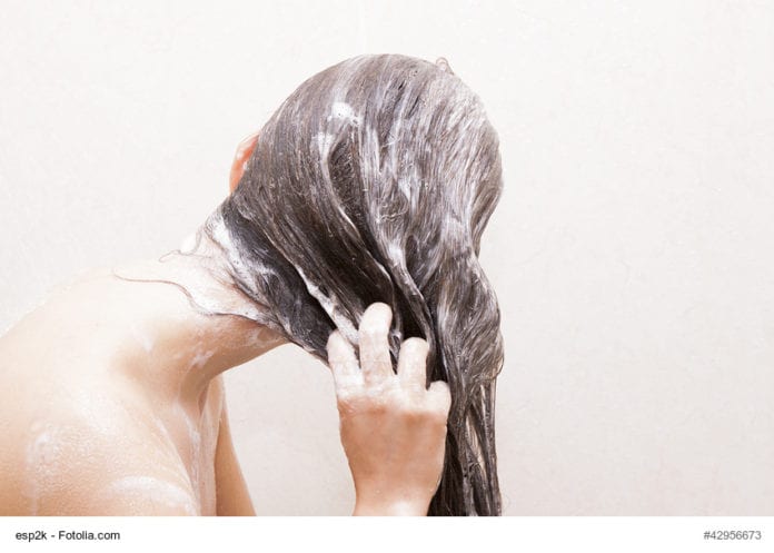 Woman Washing Hair Image