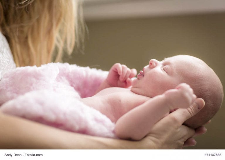 Mother Holding Newborn Image