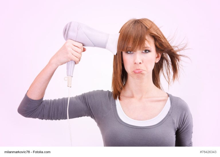 Sad Lady With Hair Dryer Image