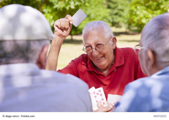 Old Man Playing Cards Image