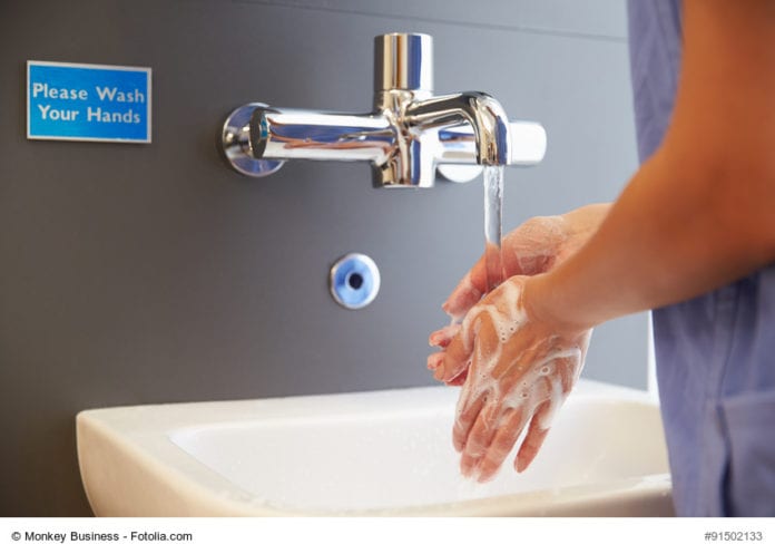 Medical Staff Washing Hands Image