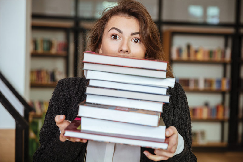 Girl_Holding_Books_image