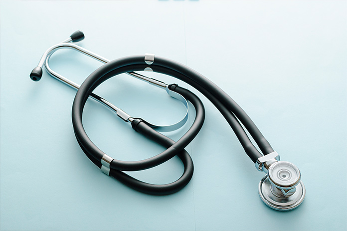 Nurse's stethoscope on a blue background