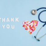 Hearts confetti and text thank you. Expressing gratitude to doctors and nurses